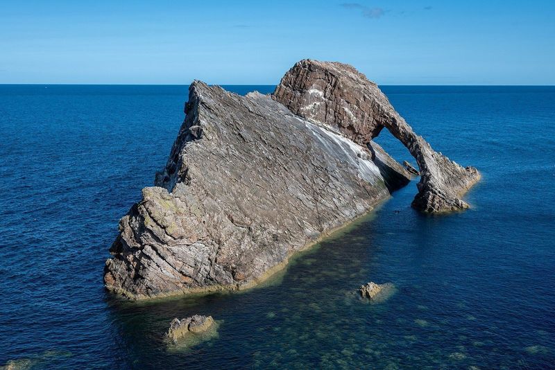 The natural sea arch of Bow Fiddle Rock at Portknockie